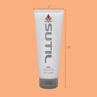 Sutil Luxe water-based lubricant in a white tube with grey cap.