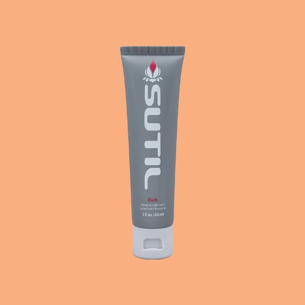 Sutil Rich thick water-based lubricant in a gray tube with a white cap.