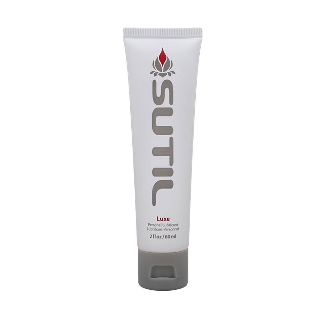 Sutil Luxe water-based personal lubricant in a white tube with a grey cap.