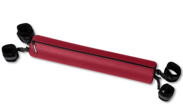Red faux leather spreader bar with black cuffs.