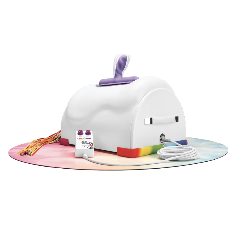 White unicorn riding sex machine with rainbow accents and a remote.
