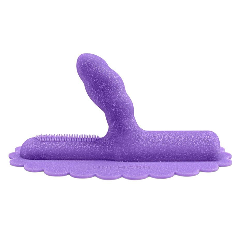 A purple glittery silicone attachment with a textured tip and a scalloped base.