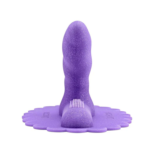 Purple silicone Uni Horn attachment with angled, textured head and suction base for Cowgirl machine.