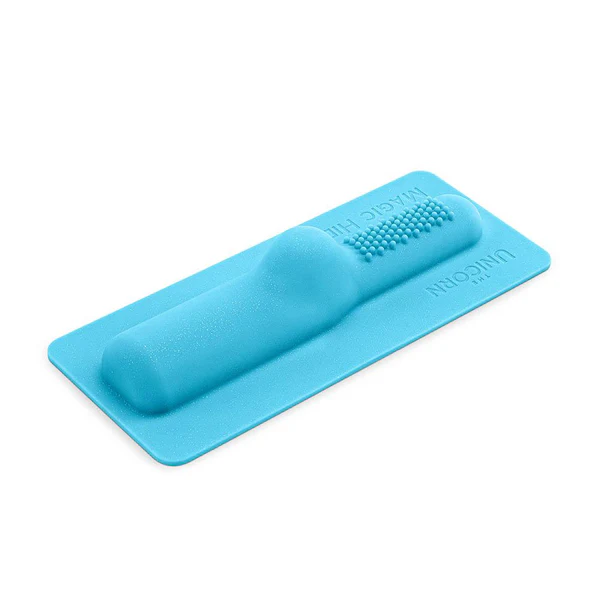 A blue silicone attachment with raised dots and text.