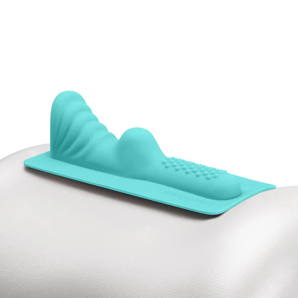 A teal clitoral and perianal attachment with textured ridges and bumps.