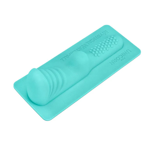 A teal clitoral and perianal attachment with textured bumps and ribbed sections.