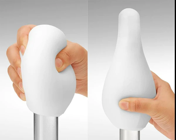 White Tenga Glacier masturbator sleeve held by hands.