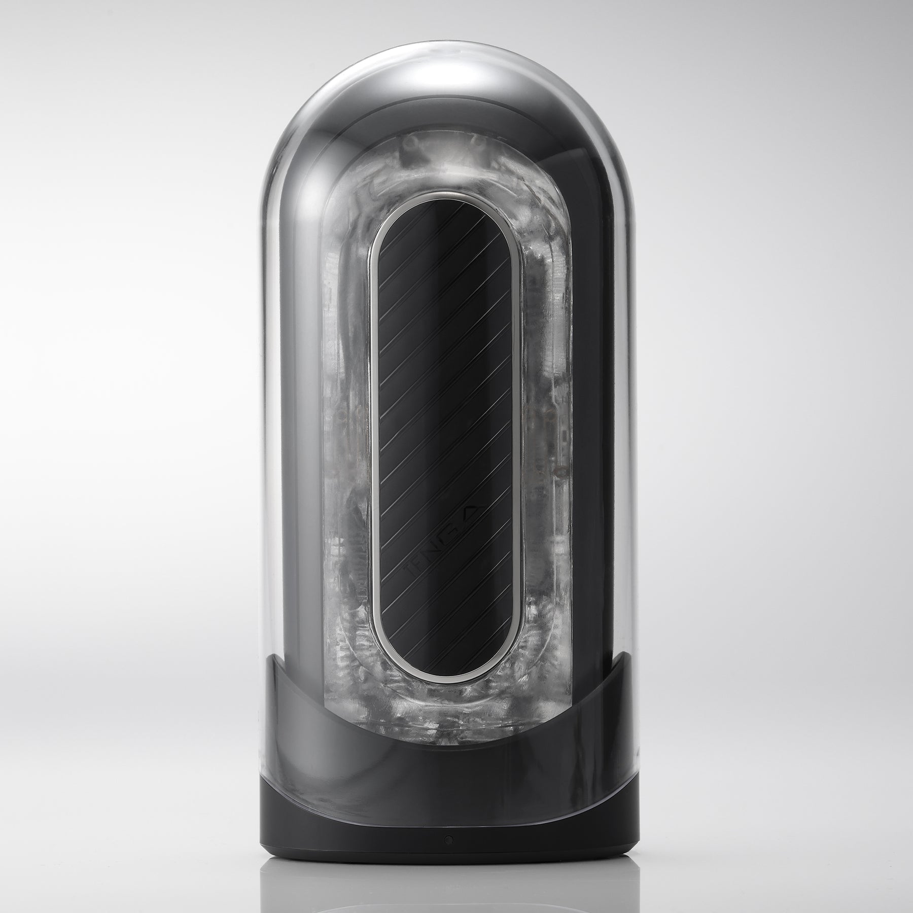 Tenga Flip Zero Gravity EV rechargeable vibrating stroker with a clear outer casing and black textured inner sleeve.