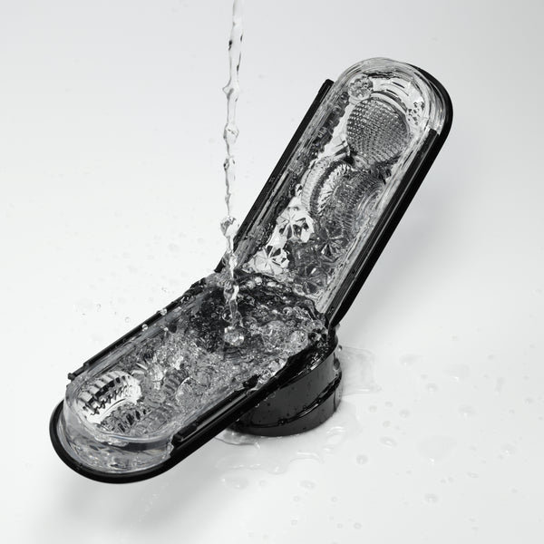 Tenga Flip Zero male masturbator being rinsed with water.