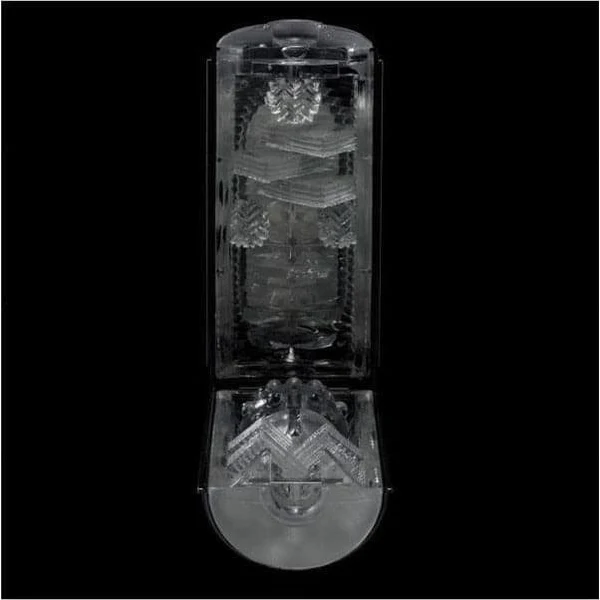 Tenga Black Edition Flip Hole masturbator with intricate internal textures.