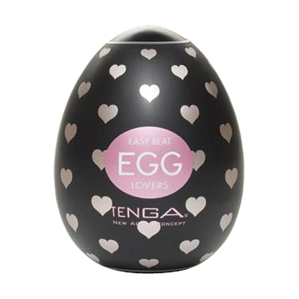 Black Tenga egg-shaped masturbator with pink hearts and text.