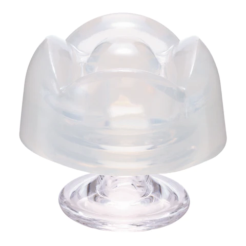 A translucent, petal-shaped pleasure item with a clear base.