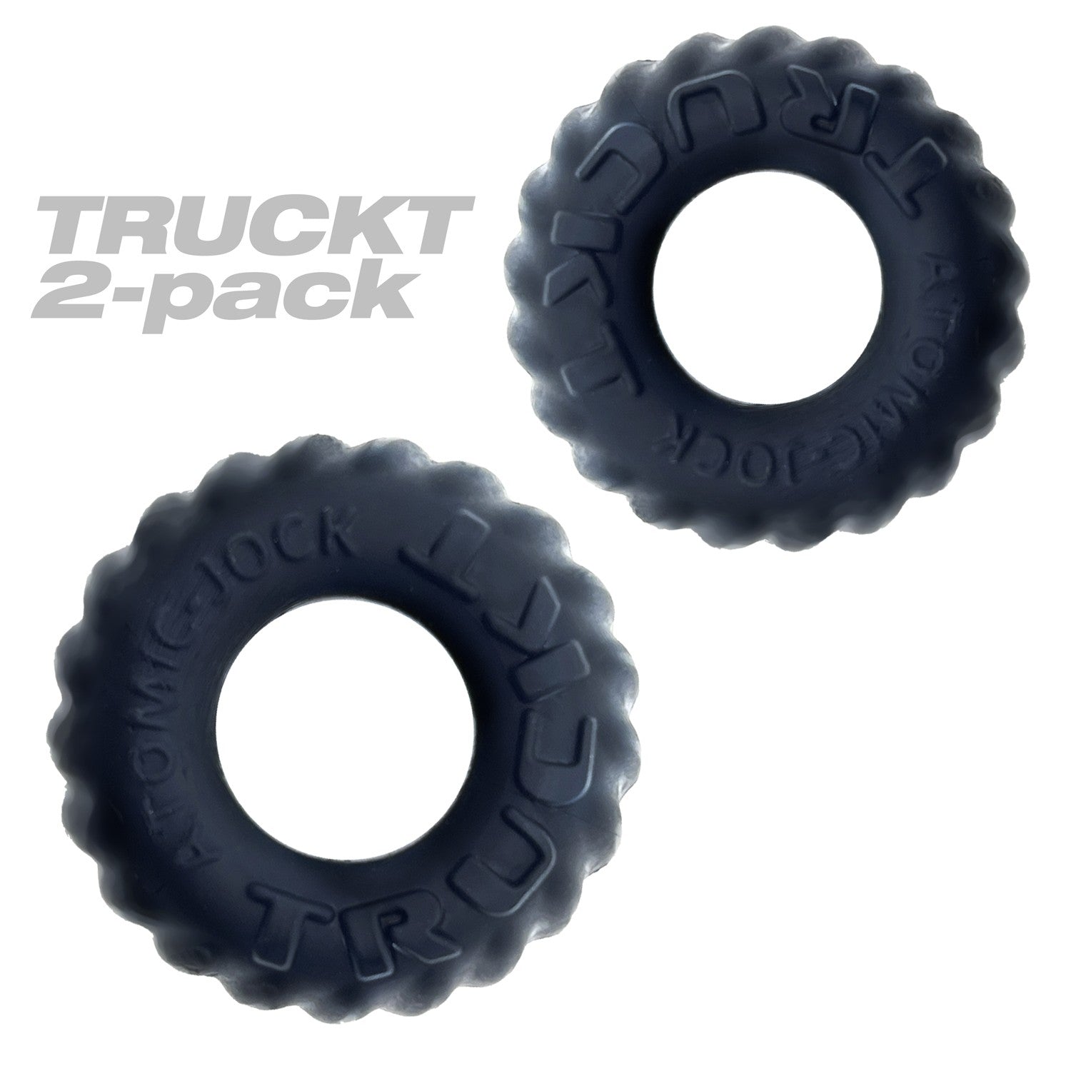 Two dark grey, textured silicone cock rings with "ATOMIG JOCK TRUCKT" embossed on them.