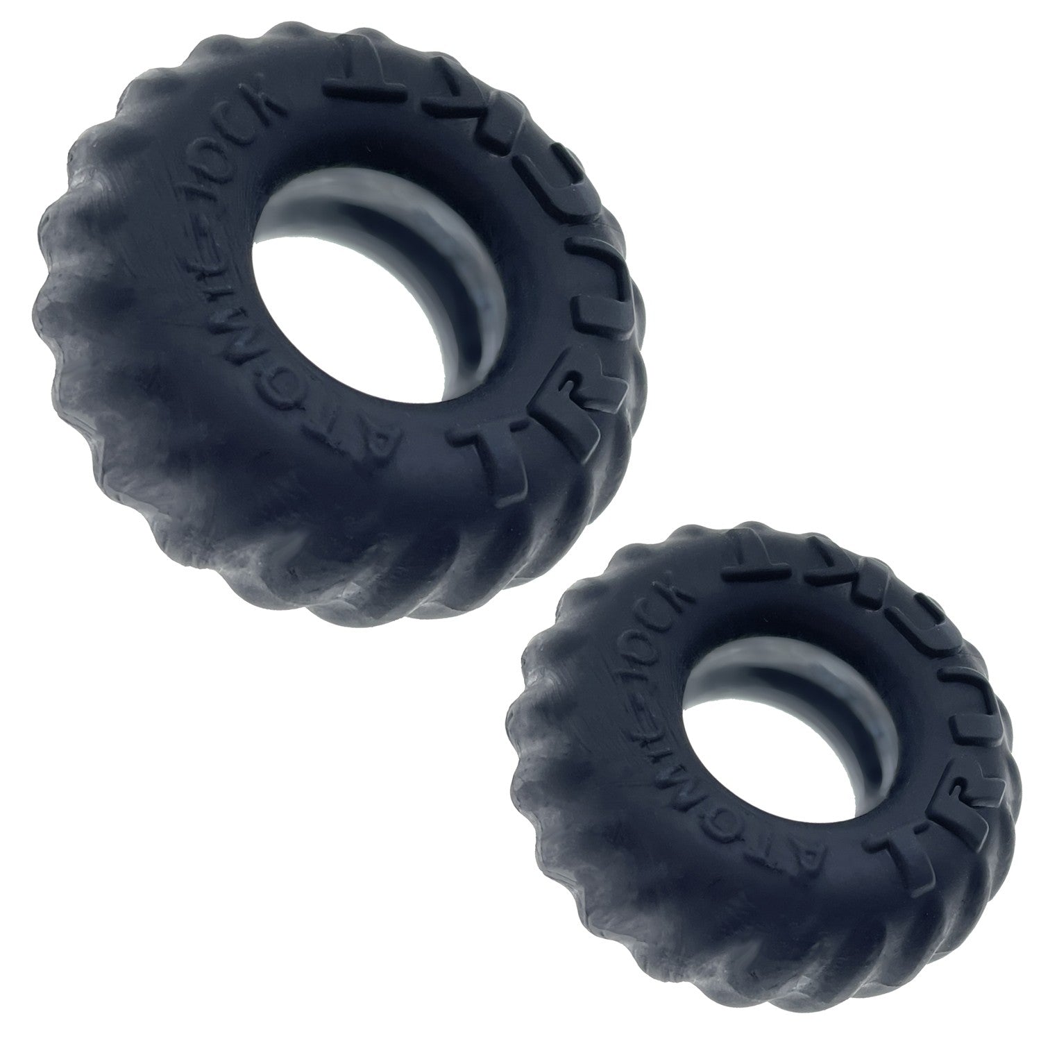 Two black silicone cock rings with tire tread texture.