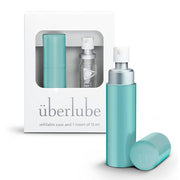 Aqua refillable lubricant case with a pump dispenser and cap.