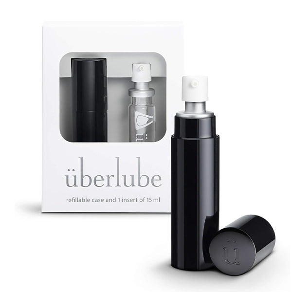 Black refillable travel lubricant case with a small insert.