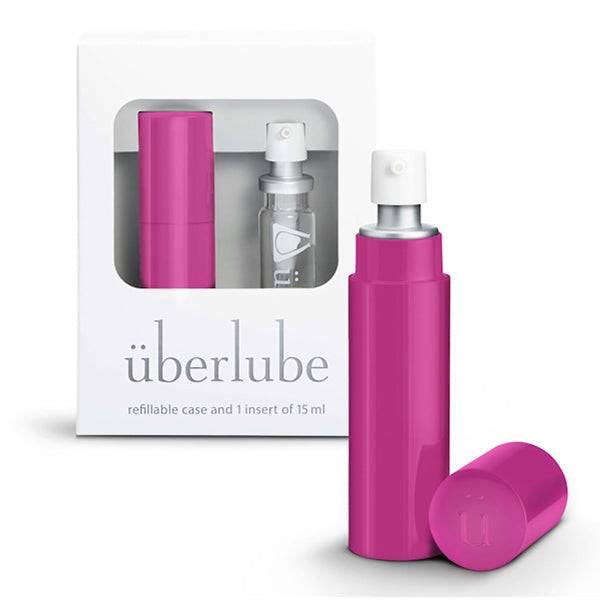 Pink refillable travel lubricant case with pump and insert.