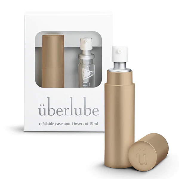 Gold metal refillable Uberlube case with a small insert.