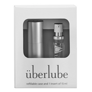 Silver refillable Uberlube case with a small bottle of lubricant.