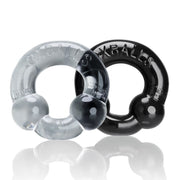 Two stretchy cock rings, one clear and one black, with dual nodules.