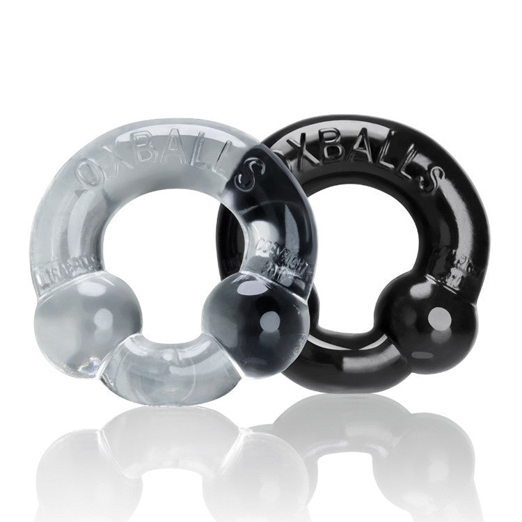 Two stretchy cock rings, one clear and one black, with dual nodules.