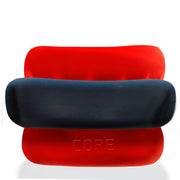 Three stacked silicone rings, two red and one dark blue, with the word "CORE" embossed on the bottom red ring.