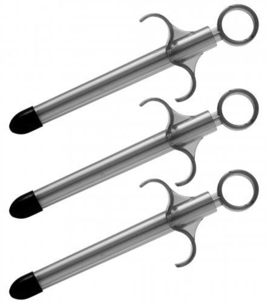 Three silver lubricant applicators with black tips and finger grips.
