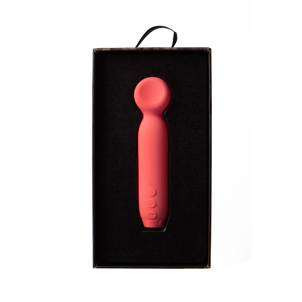 Pink wand tipped bullet vibrator with buttons in a black box.
