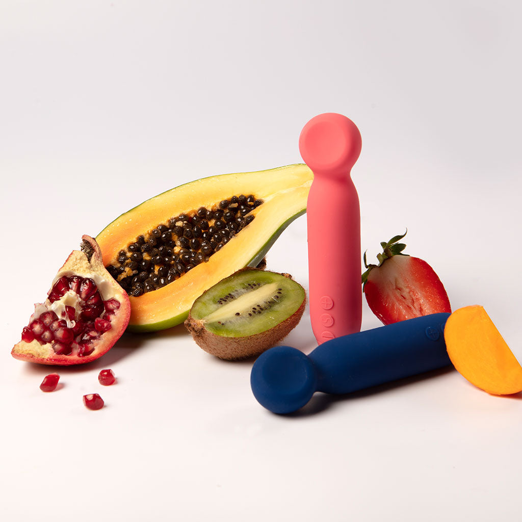 Pink wand tipped bullet vibrator with fruit.