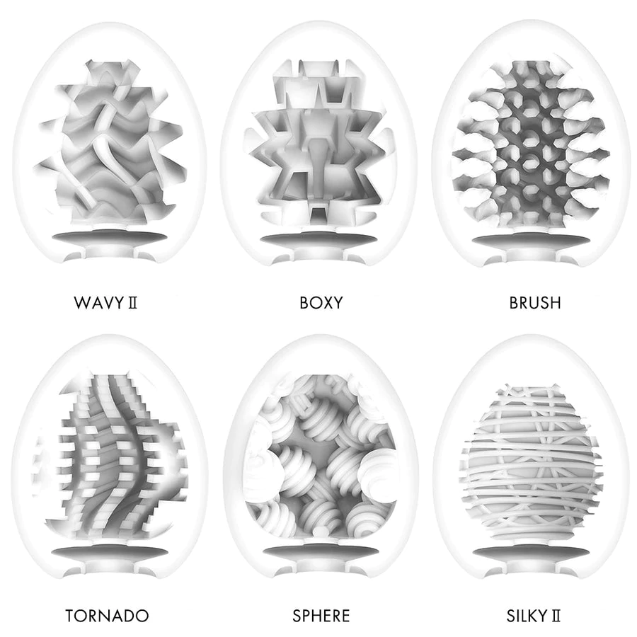 Six Tenga Egg masturbators with different internal textures: Wavy II, Boxy, Brush, Tornado, Sphere, and Silky II.
