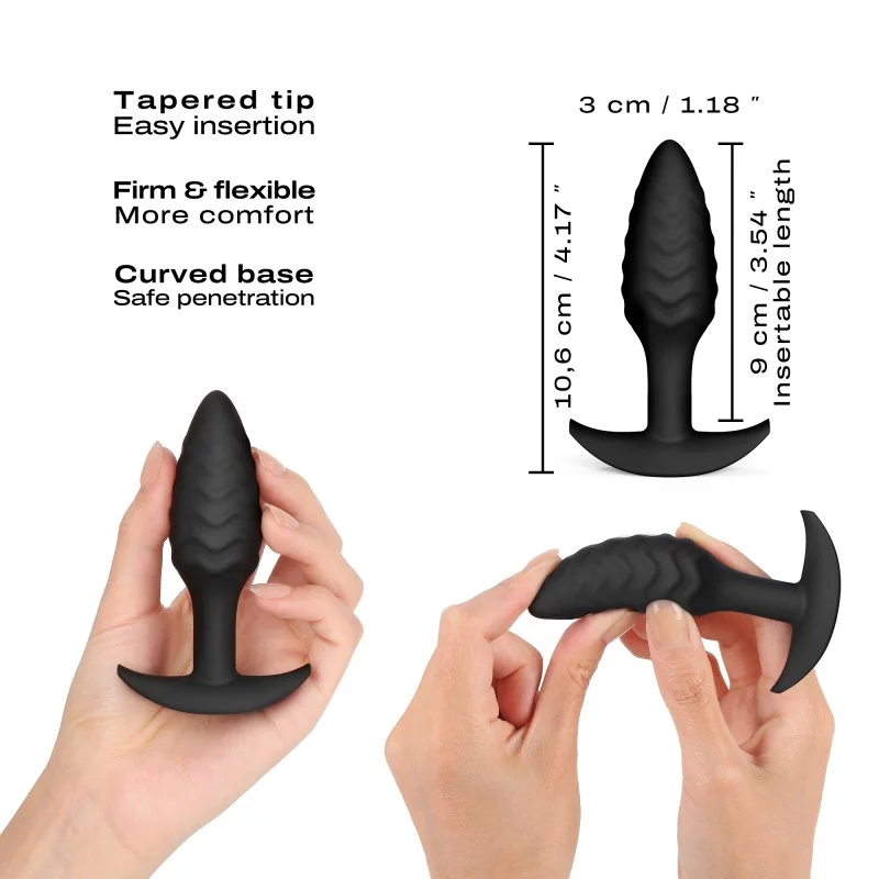 A black wavy silicone anal plug with a tapered tip and curved base.