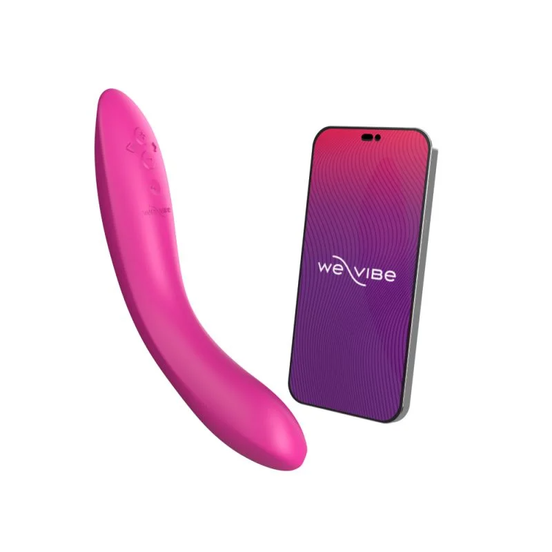 Pink app-controlled G-spot vibrator next to a smartphone.