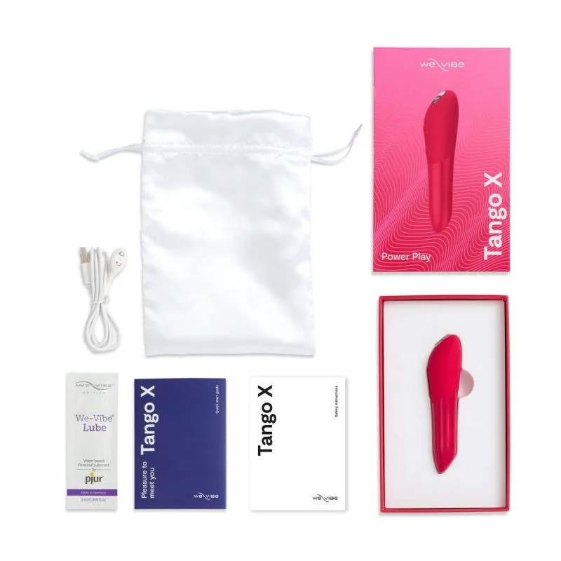 Cherry red Tango X vibrator with accessories and packaging.