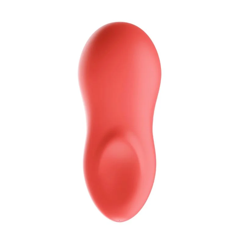 A coral-colored vibrating massager with a curved shape.