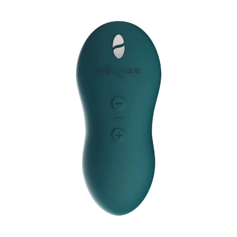A teal We-Vibe Touch X massager with power and intensity buttons.