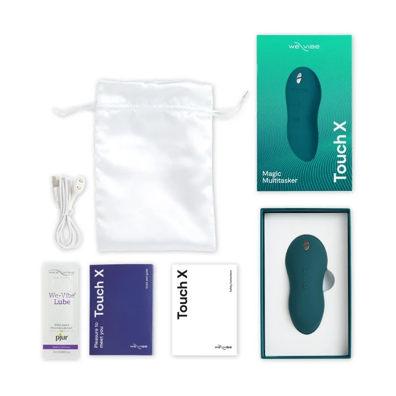 We-Vibe Touch X massager with accessories in a box.