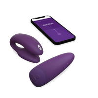 Purple app-controlled couples vibrator with a remote.