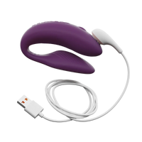Purple We-Vibe Chorus couples vibrator with USB charging cable.