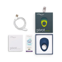 Midnight blue silicone app-controlled vibrating cock ring with charging cable and lube.