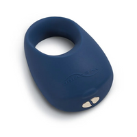 A blue silicone vibrating cock ring with two silver buttons.