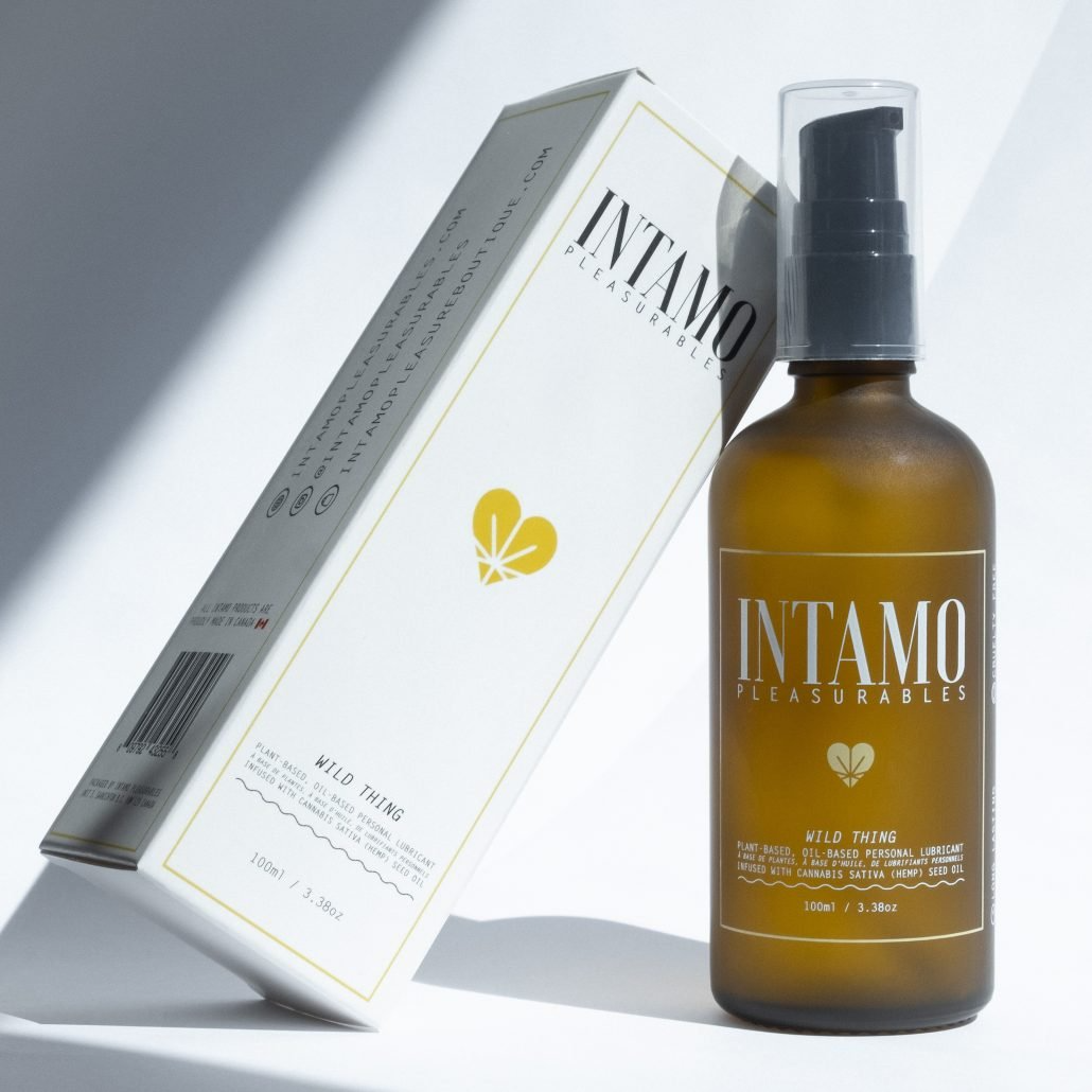 Intamo Wild Thing oil-based personal lubricant in a brown glass bottle with a pump.