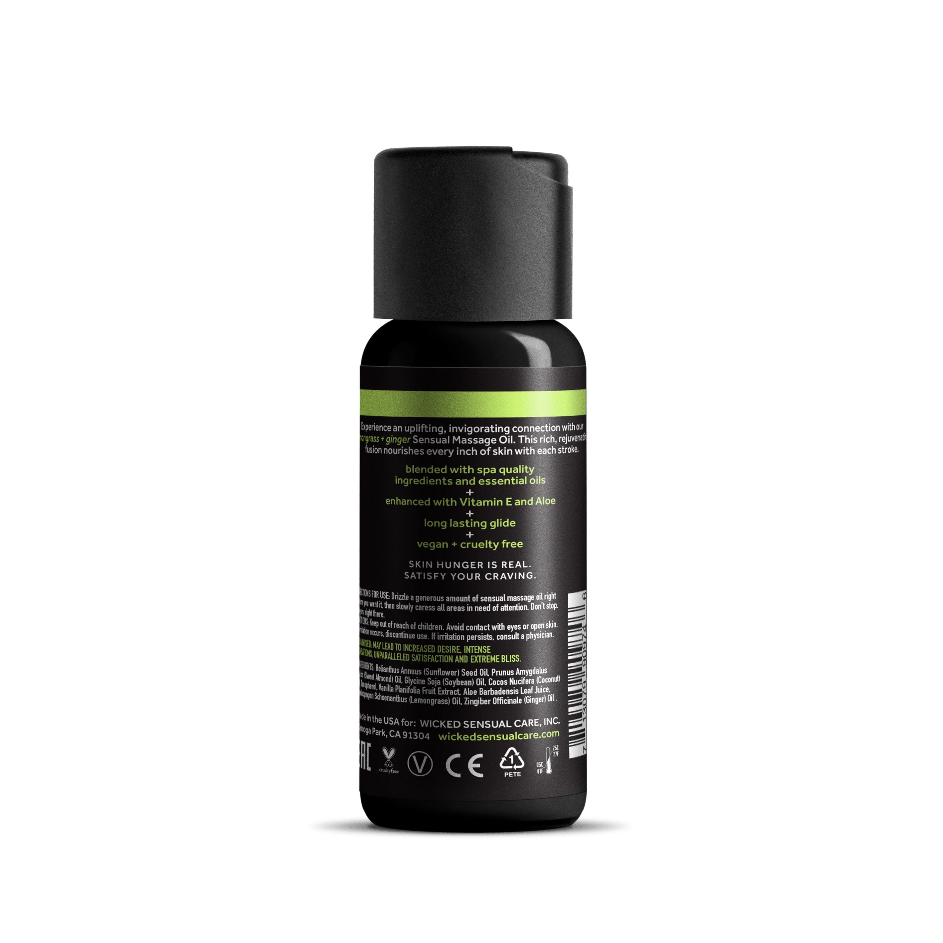 A bottle of Lemongrass & Ginger Sensual Massage Oil with Vitamin E.