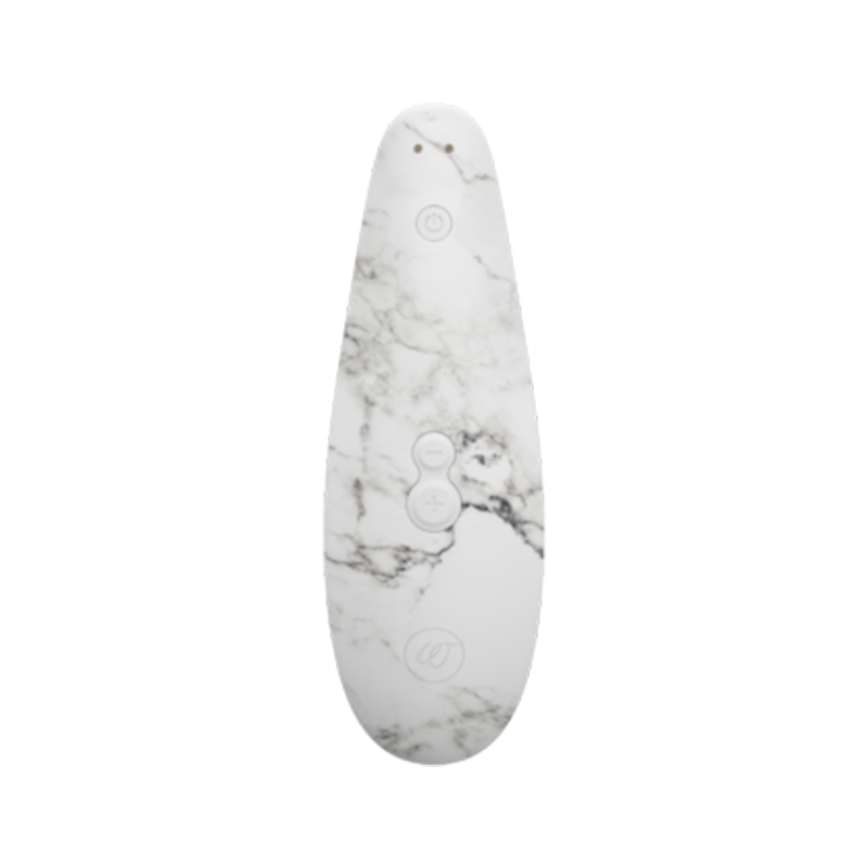 Womanizer clitoral stimulator with marble pattern and control buttons.