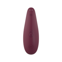 Womanizer Bordeaux clitoral stimulator with power and intensity buttons.