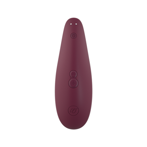 Womanizer Bordeaux clitoral stimulator with power and intensity buttons.