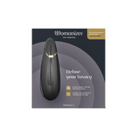Womanizer Premium 2 clitoral vibrator in black with gold accents.
