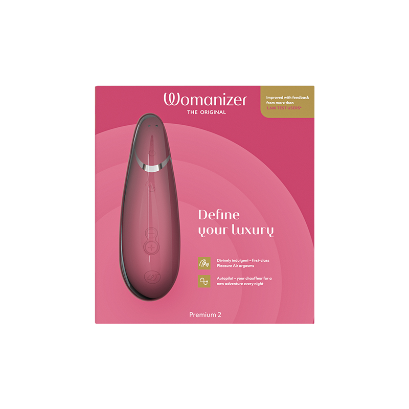 Womanizer Premium 2 clitoral vibrator in pink with text "Define your luxury".