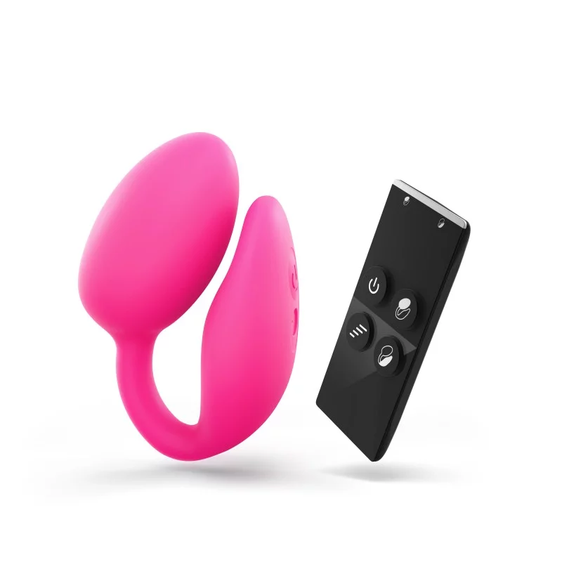A pink dual motor vibrator with a black remote control.