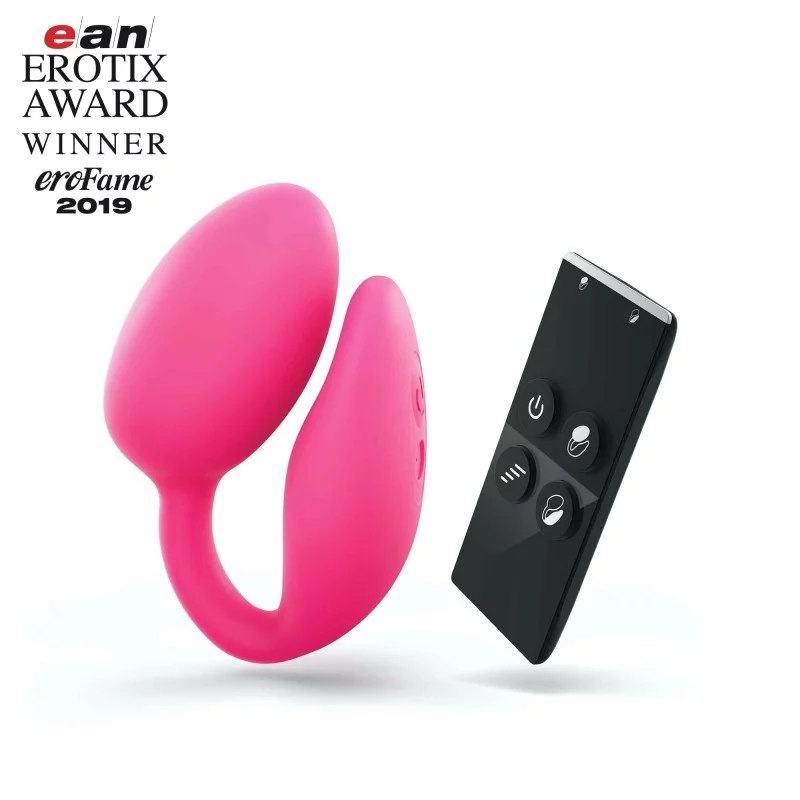 A pink dual motor vibrator with a black remote control.