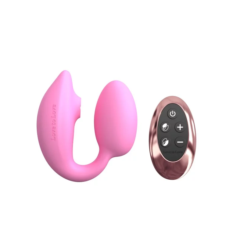 Pink dual stimulator with flapping action and rose gold remote.